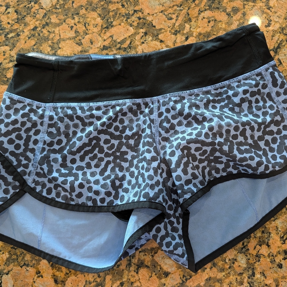 Lululemon Run: Speed Shorts featuring an Ace Spot Lullaby Black pattern.